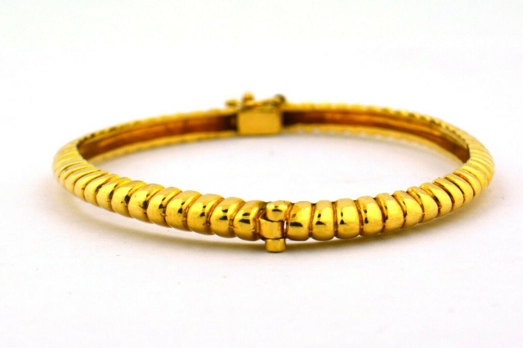 14 Karat Yellow Gold 4.2MM Ribbed Twist Hinged Oval Bracelet 15G - Jewelry Works